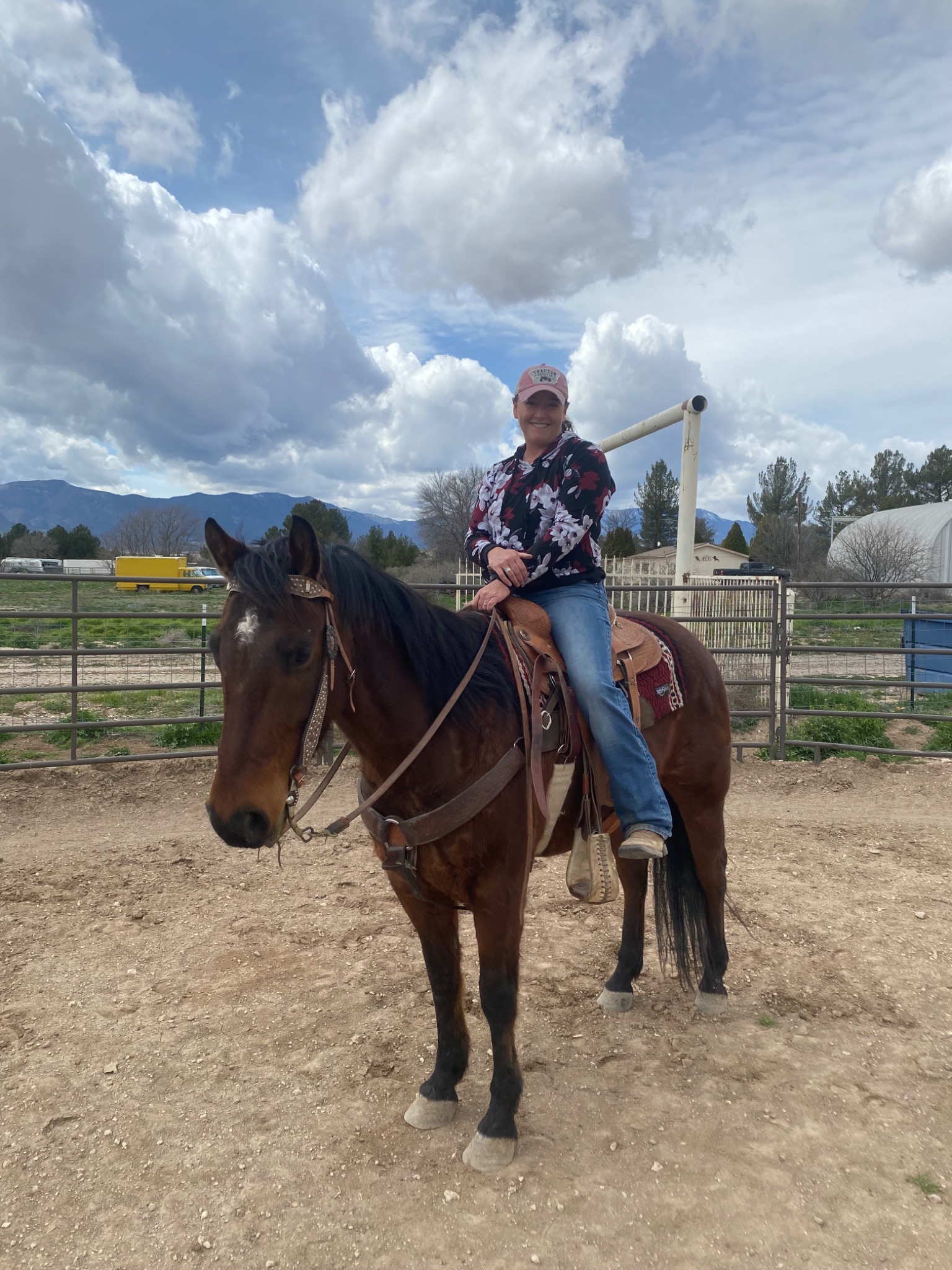 Chelise riding a brown horse